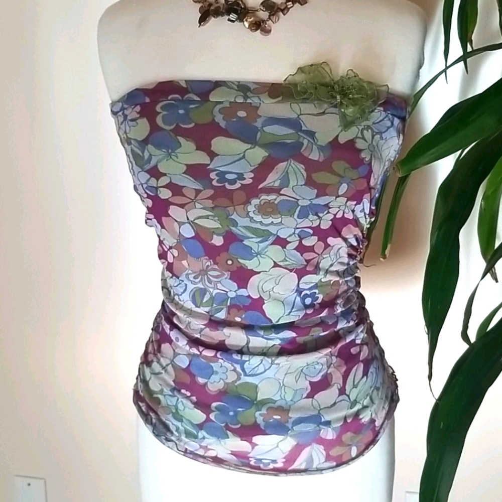 Nylon strapless top with built in bralette.
